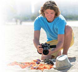 Man at beach shoots objects on towel with Vari-angle LCD
